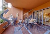 Buy ground floor apartment with large terrace in Costa Blanca close to golf in Villamartin. ID: 6068