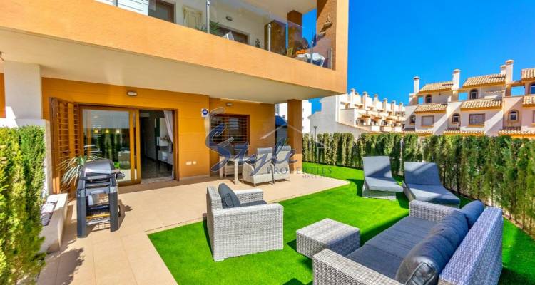 Buy ground floor apartment with large terrace in Costa Blanca close to golf in Villamartin. ID: 6163