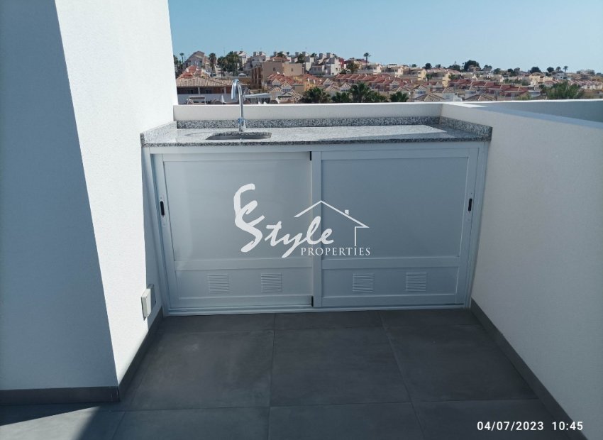 Adosados de nueva construcción en venta en Villamartín, Costa Blanca, España. ON1782