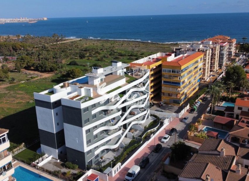Apartamento moderno en Punta Prima, Torrevieja con vistas al mar e infinity pool. Costa Blanca, Spain. ID2755