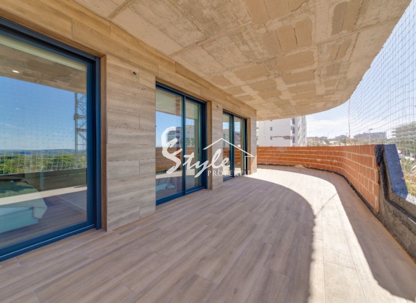 Apartamento nuevo en venta cerca de la playa en Arenales del Sol, Costa Blanca, España.ON1555