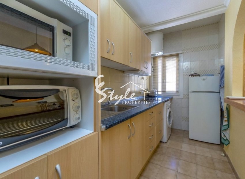 Beachside apartment just only 200 m from the sea in the urbanization of Punta Prima, Costa Blanca, Spain