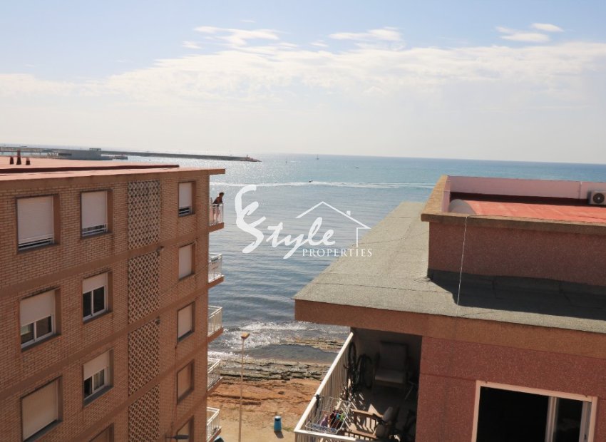 Buy penthouse apartment in Costa Blanca steps from the sea and beach in Torrevieja, Playa de los Naufragos. ID: 6173
