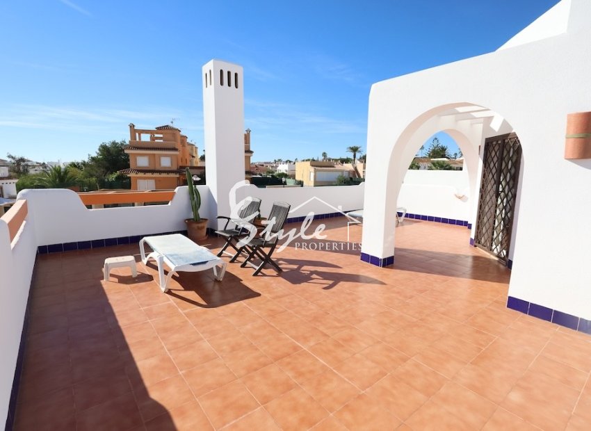 Buy townhouse in Lomas de Campoamor close to sea. ID ST-6357