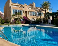 Buy townhouse with garden and pool in Torrevieja, 200 m to the beach. ID 6141