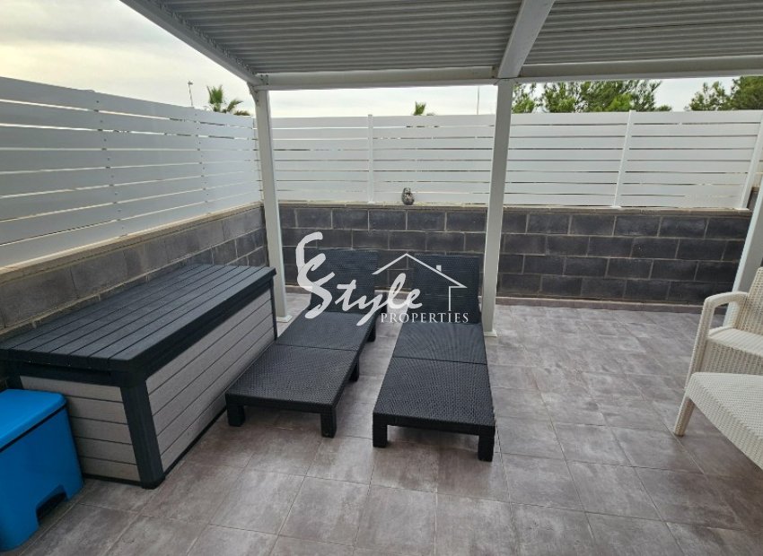 Buy townhouse with garden and pool in Torrevieja. ID 6300