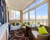 For sale a penthouse with the sea views and garden in La Cinuelica, Punta Prima, Costa Blanca. ID3336