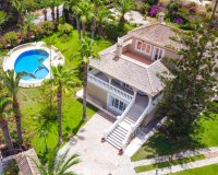 For sale an exclusive luxury villa with a large plot in Villamartin, Costa Blanca, Spain. ID3484