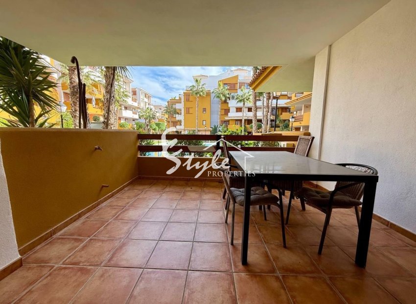 For sale  apartment with the views to community area in La Recoleta, Punta Prima, Costa Blanca, Spain. ID2698