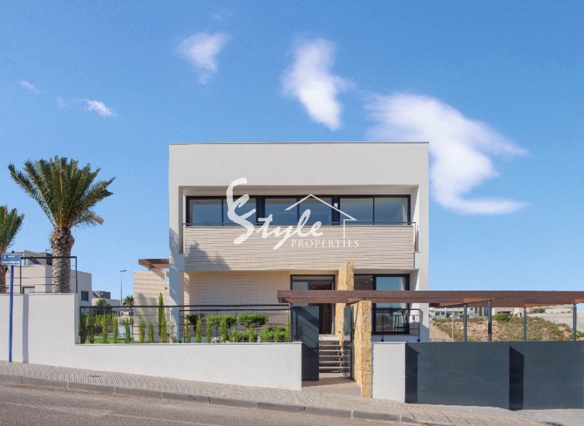 For sale beach side new villa en Dehesa de Campoamor, Costa Blanca, Spain.ON1370
