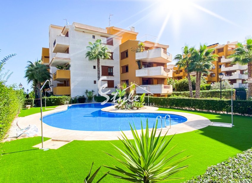 For sale beach side  south facing apartment in Parque Recoleta, Punta Prima, Torrevieja, Costa Blanca,Spain. ID3533