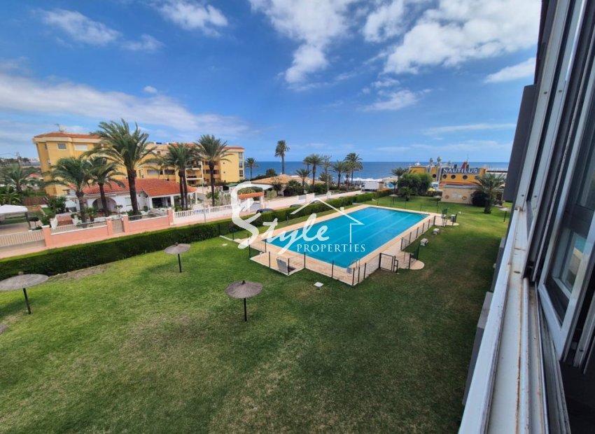 For sale beachside apartment with the sea views in Punta Prima, Costa Blanca, Spain. ID1969