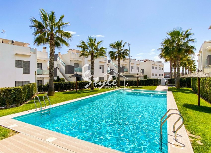 For sale modern 3-bedroom apartment on the ground floor with a garden in Punta Prima, Orihuela Costa. ID2688