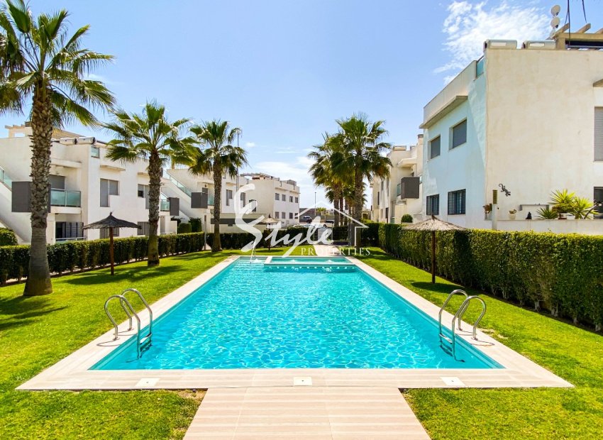 For sale modern 3-bedroom apartment on the ground floor with a garden in Punta Prima, Orihuela Costa. ID2688