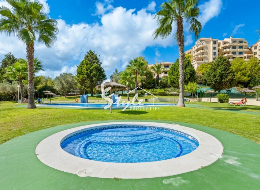 For sale penthouse with sea and golf views in Campoamor, Costa Blanca, Spain. ID1923