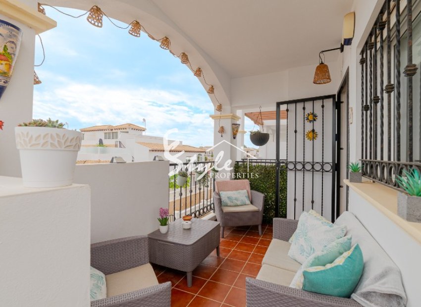 For sale top floor apartment with private solarium and parking in La Ciñuelica, Punta Prima, Costa Blanca. ID1965