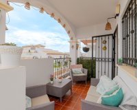 For sale top floor apartment with private solarium and parking in La Ciñuelica, Punta Prima, Costa Blanca. ID1965