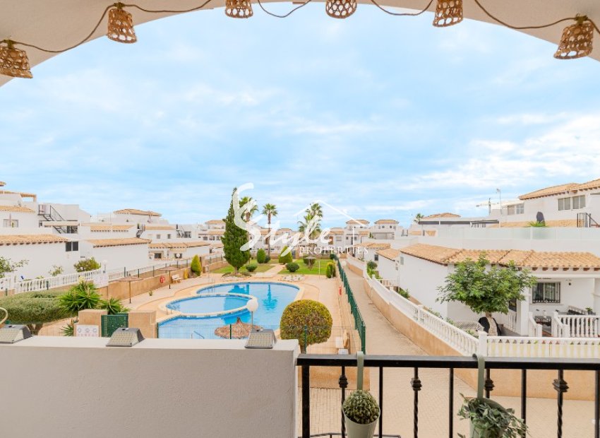 For sale top floor apartment with private solarium and parking in La Ciñuelica, Punta Prima, Costa Blanca. ID1965