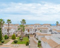 For sale top floor apartment with private solarium and parking in La Ciñuelica, Punta Prima, Costa Blanca. ID1965