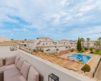 For sale top floor apartment with private solarium and parking in La Ciñuelica, Punta Prima, Costa Blanca. ID1965