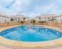 For sale top floor apartment with private solarium and parking in La Ciñuelica, Punta Prima, Costa Blanca. ID1965