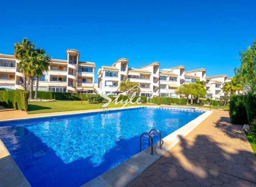 For sale townhouse of 3 bedrooms with sea views in Punta Prima, Los Altos, Costa Blanca, Spain. ID2338