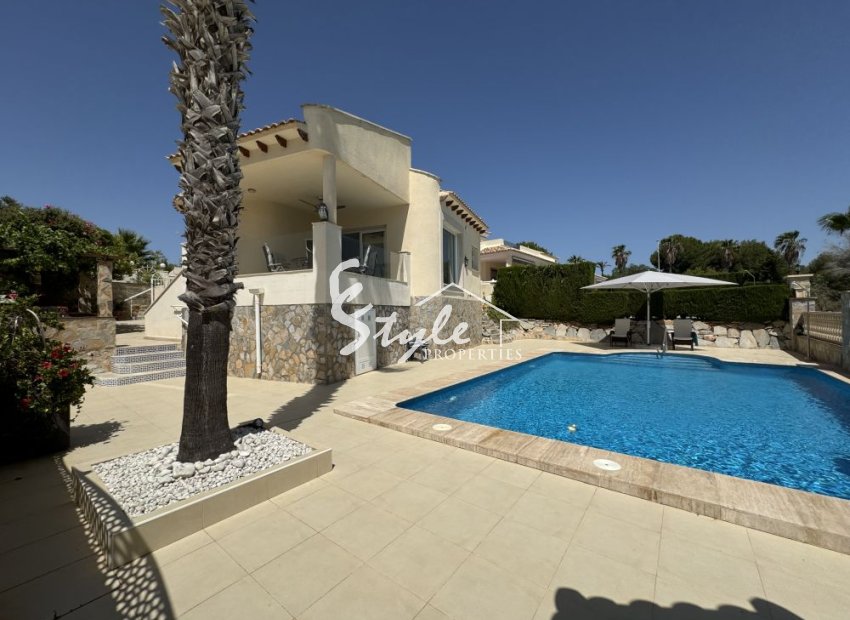 For sale villa in front of golf courses in Las Ramblas, Orihuela Costa, Spain. ID1440