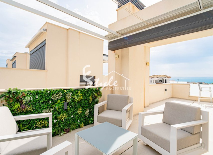 Modern detached villa with sea views, 4 bedrooms, for sale in Punta Prima, Costa Blanca, Spain. ID2930