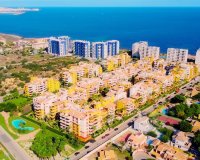 Se vende apartamento de 2 dormitorios con vistas a la piscina en La Recoleta, Punta Prima, Costa Blanca. ID2223