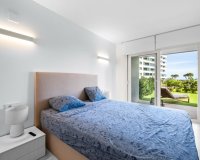 Se vende apartamento en primera línea con jardín privado en Posidonia, Punta Prima, Costa Blanca. ID2354