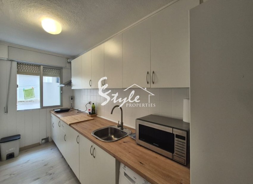 Se vende apartamento junto a la playa con vistas al mar en Punta Prima, Costa Blanca, España. ID1969