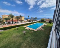 Se vende apartamento junto a la playa con vistas al mar en Punta Prima, Costa Blanca, España. ID1969