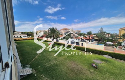 For sale beachside apartment with the sea views in Punta Prima, Costa Blanca, Spain. ID1969