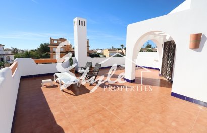 Купить семейный таунхаус с видом на море недалеко от пляжа в Lomas de Campoamor. ID ST-6357