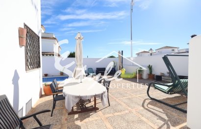 Купить семейный таунхаус с видом на море недалеко от пляжа в Lomas de Campoamor. ID ST-6357