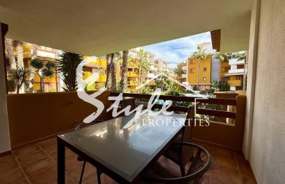 For sale  apartment with the views to community area in La Recoleta, Punta Prima, Costa Blanca, Spain. ID2698