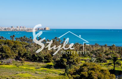 Exclusive modern apartment in Punta Prima, Torrevieja with sea views and infinity pool. Costa Blanca, Spain. ID2755