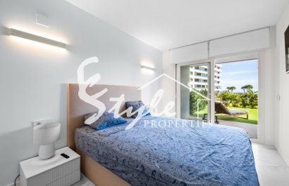 For Sale Frontline Apartment With Private Garden in Posidonia, Punta Prima, Costa Blanca. ID2354