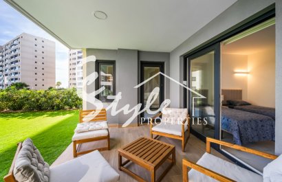 For Sale Frontline Apartment With Private Garden in Posidonia, Punta Prima, Costa Blanca. ID2354