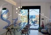 for sale beach side new  apartments with 3 bedrooms in Costa Blanca. ID.ON773