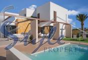 For sale beach side new villa en Dehesa de Campoamor, Costa Blanca, Spain.ON1370