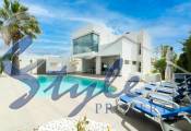 Buy Villa with pool in Costa Blanca close to sea in Cabo Roig, Orihuela Costa. ID: 4912