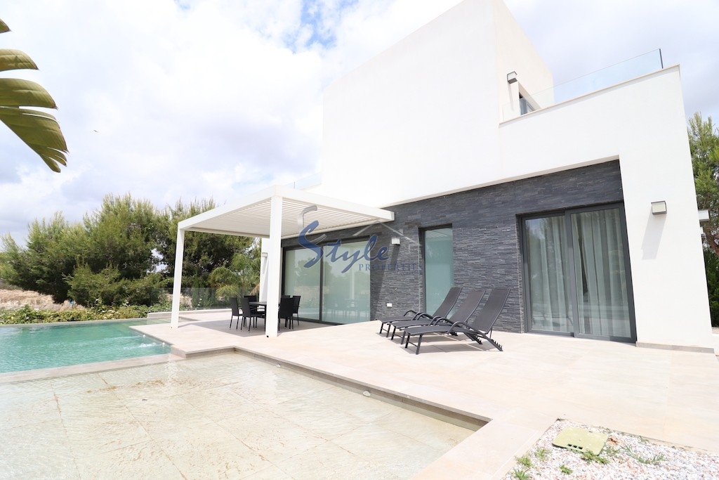Comprar villa de lujo con zonas ajardinadas y piscina en Las Colinas Golf & Country Club, Villamartín, Orihuela Costa. id 6050