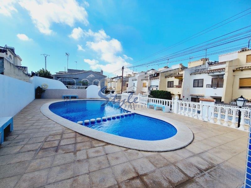 Buy townhouse with garden and pool in Torrevieja. ID 6103