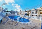 Buy townhouse with garden and pool in Torrevieja. ID 6103