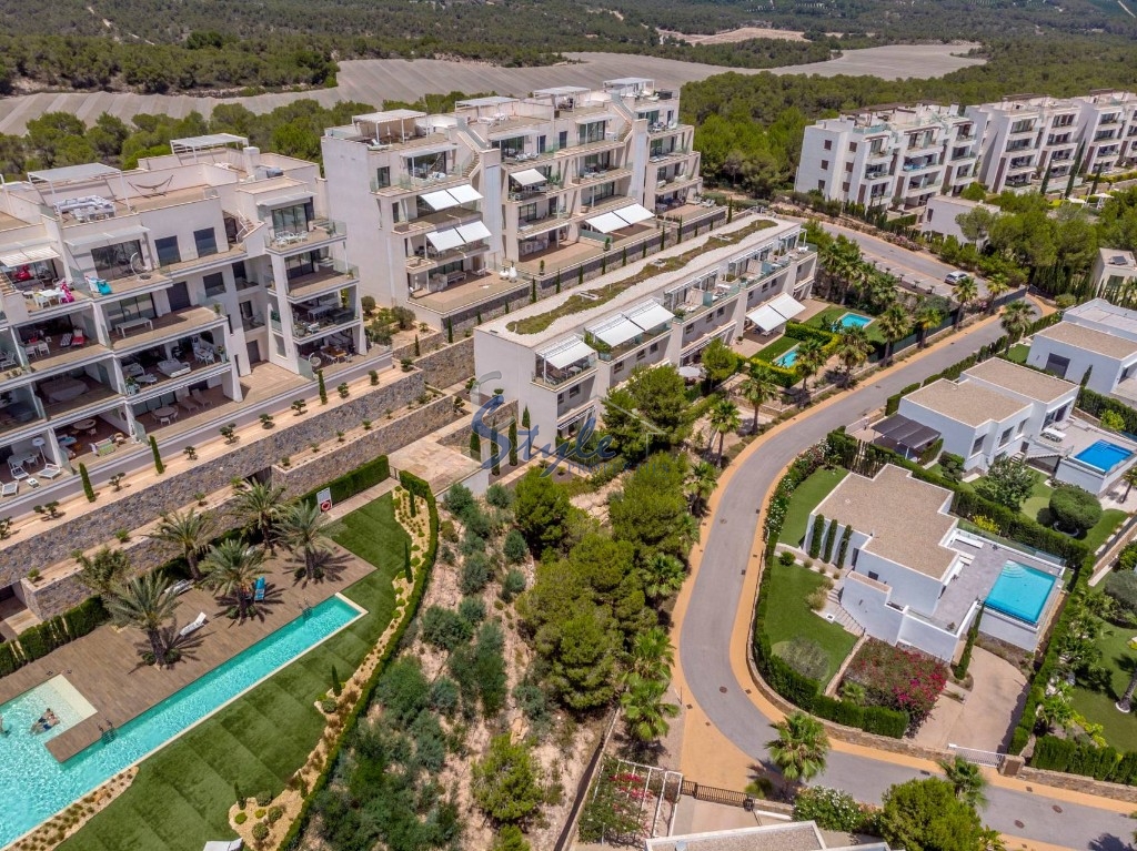 Comprar apartamento con piscina comunitaria en Las Colinas Golf & Country Club, Orihuela Costa. id 6164