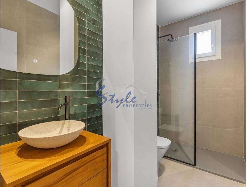 Новые квартиры на первом этаже на продажу недалеко от моря в Торревьехе, Коста Бланка, Испания, ON1901